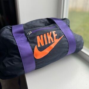 Nike Black and Orange Duffel Bag with Purple Straps